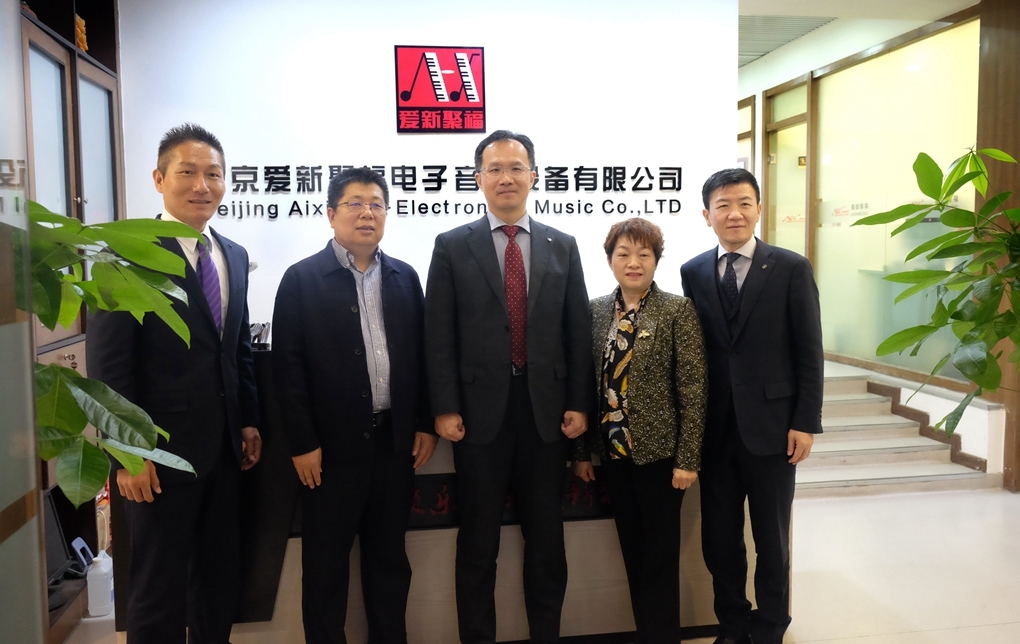 雅马哈总经理山浦墩到访爱新聚福